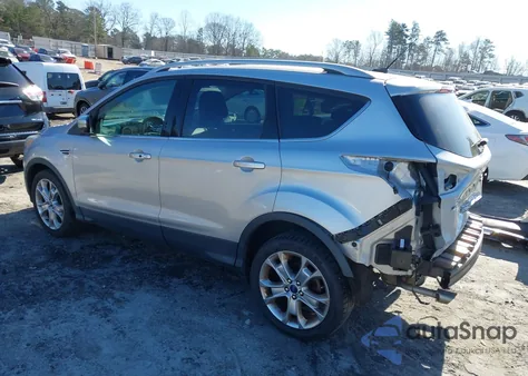 2014 Ford Escape Titanium z USA, uszkodzony, nr VIN 1FMCU0JX6EUA27437